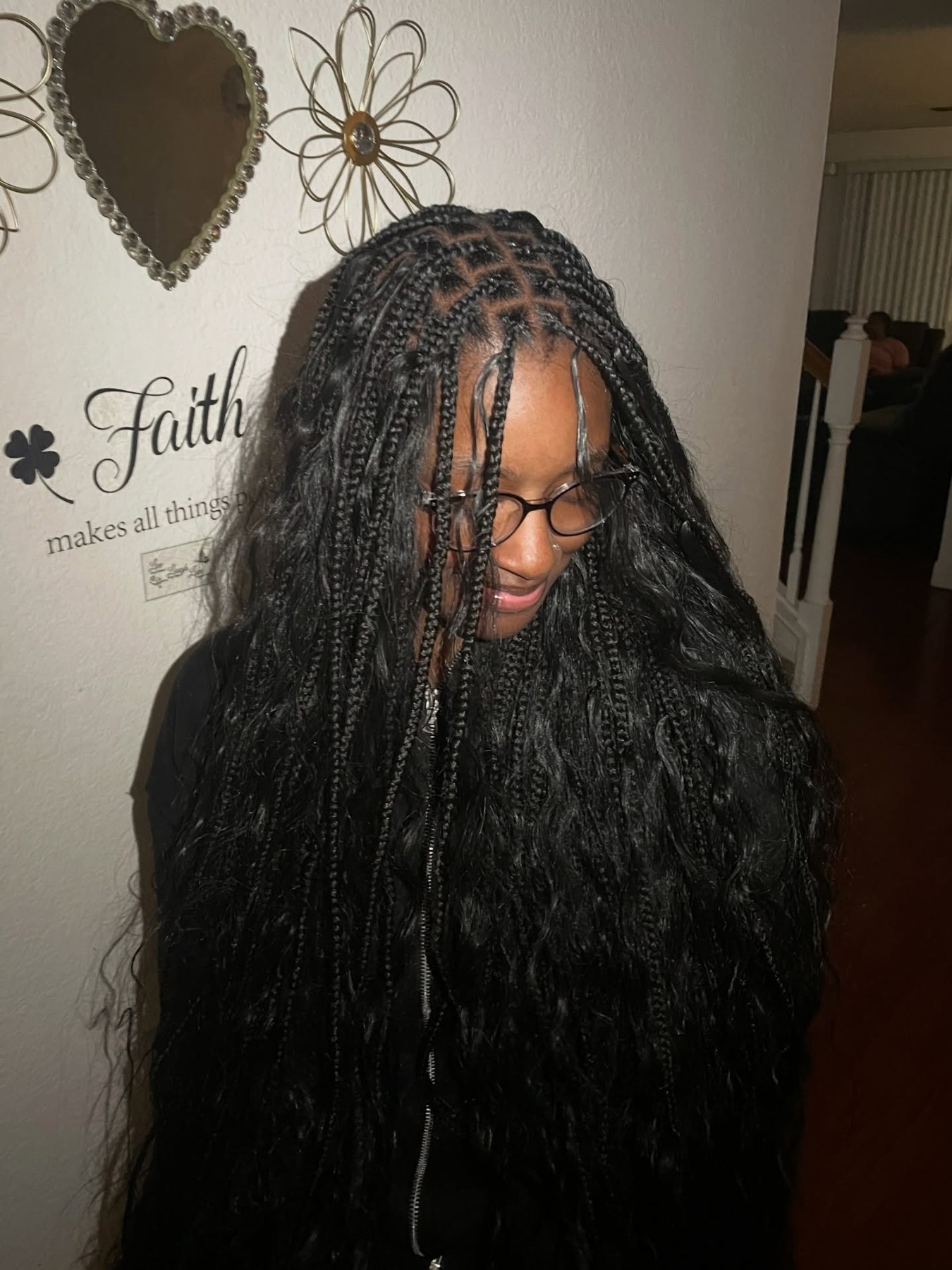 Small knotless bohemian braids with full loose curls