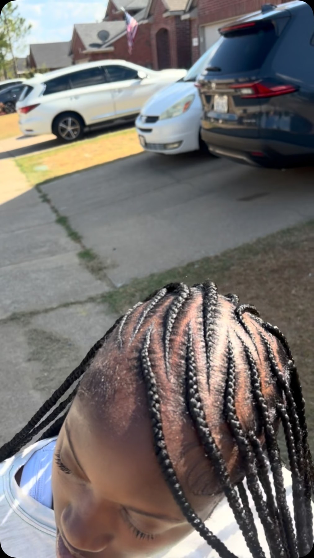 Fulani braids with precise curved parting