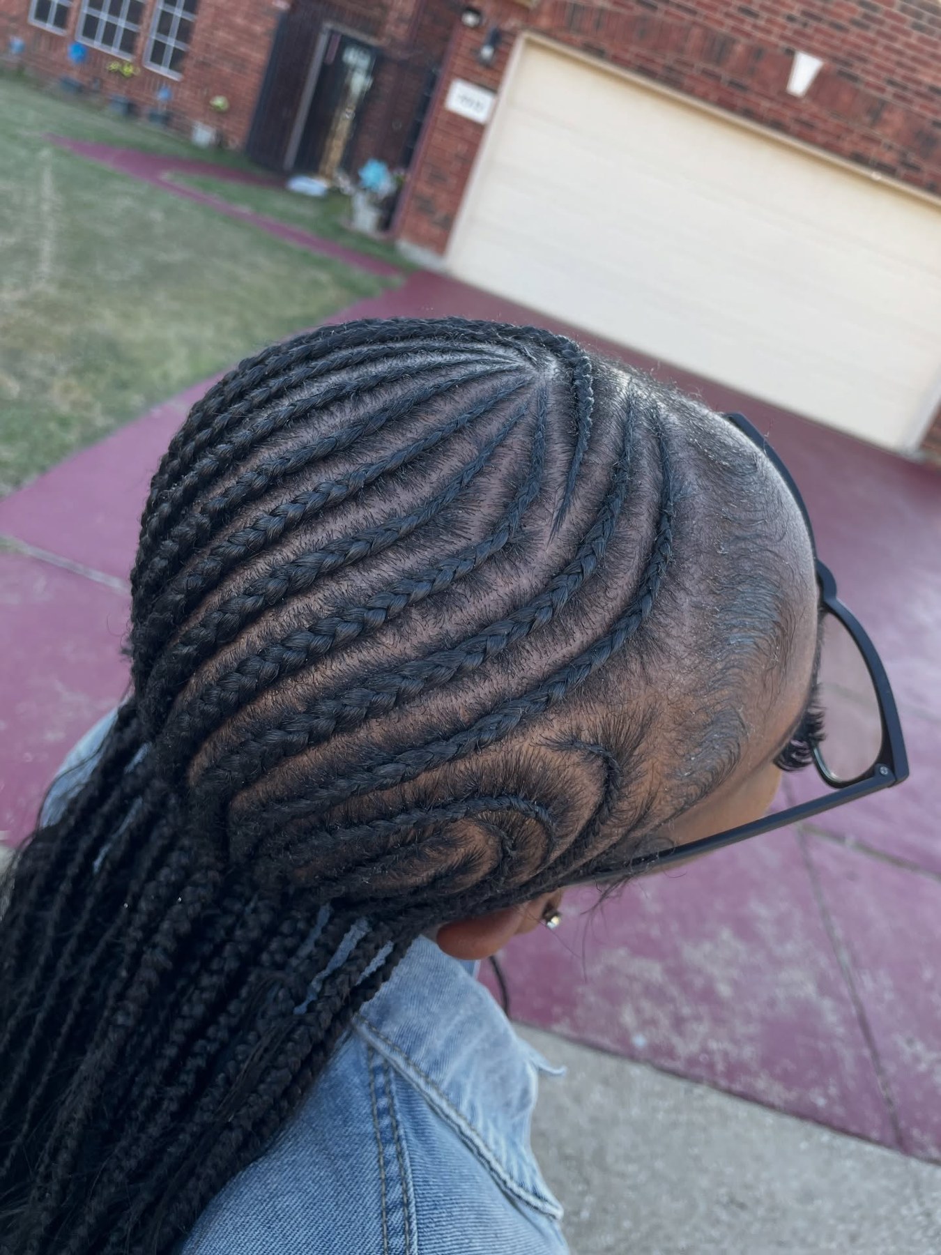 Lemonade Fulani braids with sweeping side cornrows